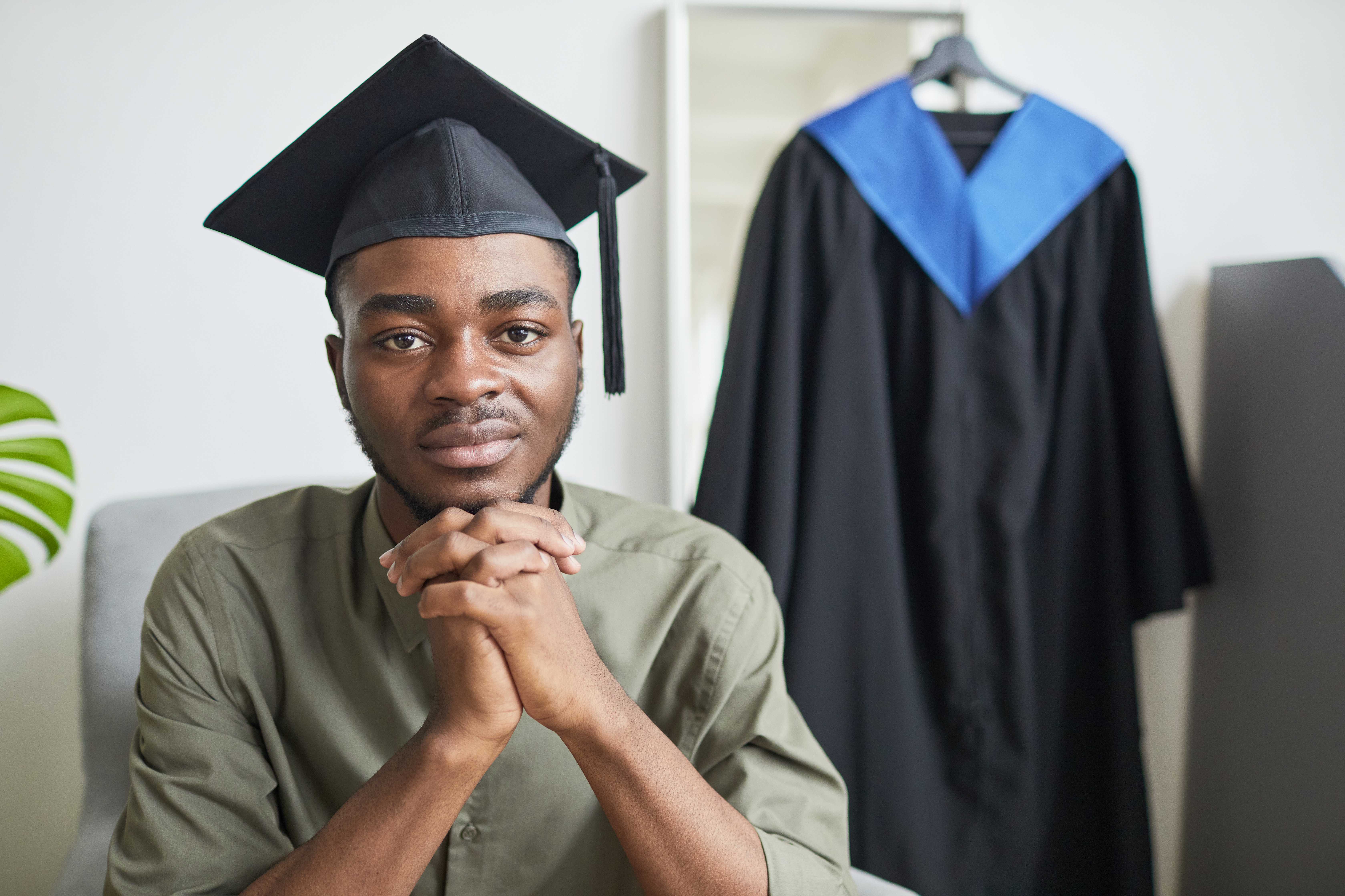 african american man preparing for graduation